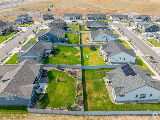 Homes in the Mountain View Meadows neighborhood have meticulously maintained yards.
