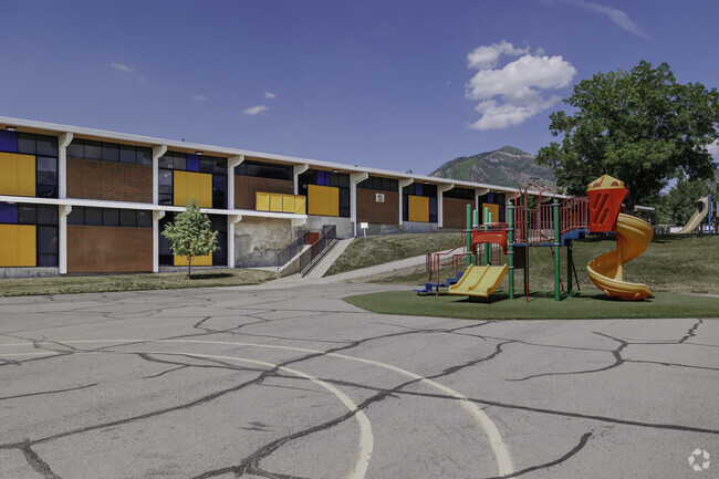 Howard Driggs  incorporates vibrant colors both on its playground as well as  the building.