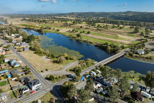 The small but charming town of Surf Pines offers miles of seashore, lakes, and golf courses.