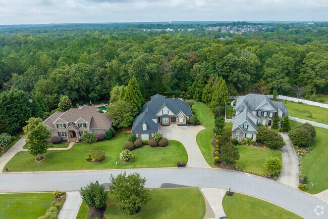 Large homes on beautiful lots are present all over the Five Forks area.