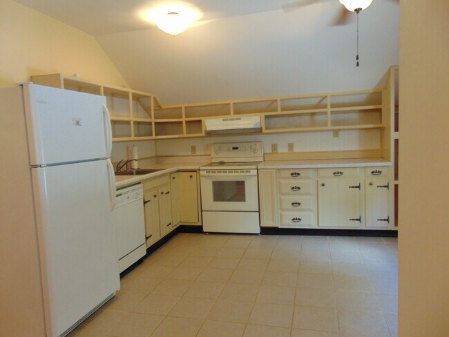 Ktichen showing appliances and cupboards.