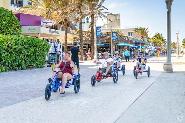 Explore Hollywood Beach by cycling along the scenic coastline.