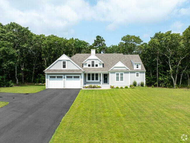 Perfectly manicured lawns of New Traditional homes can be found all over West Barnstable.
