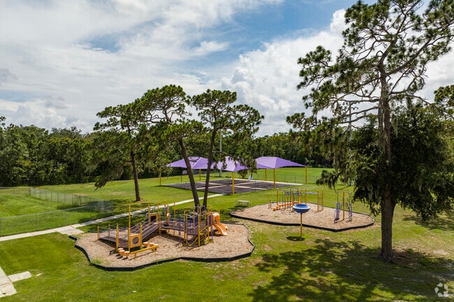 Kingswood Elementary School boasts lovely grounds and a shaded play area.