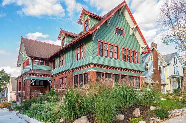 This historic West Central home features cedar shake shingles with a bold trim color.