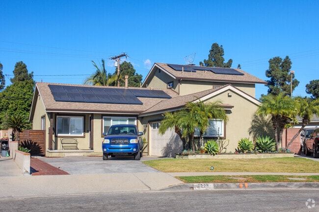 Pico Rivera has some split level homes with wide driveways.