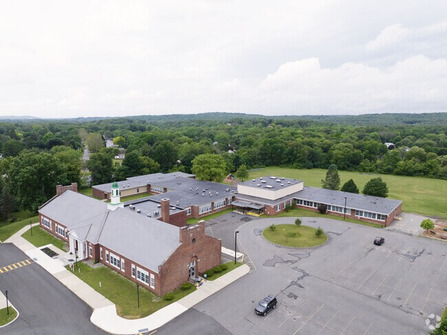 Serving K-5 Sutherland School has a lovely campus and drop off circle.