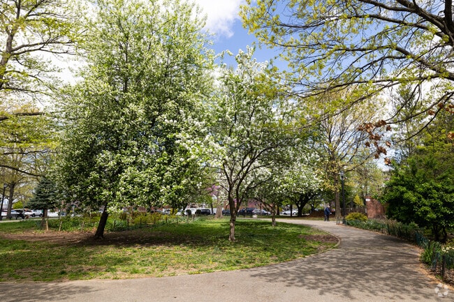 Ample green spaces are available throughout Middle Village for residents to enjoy.