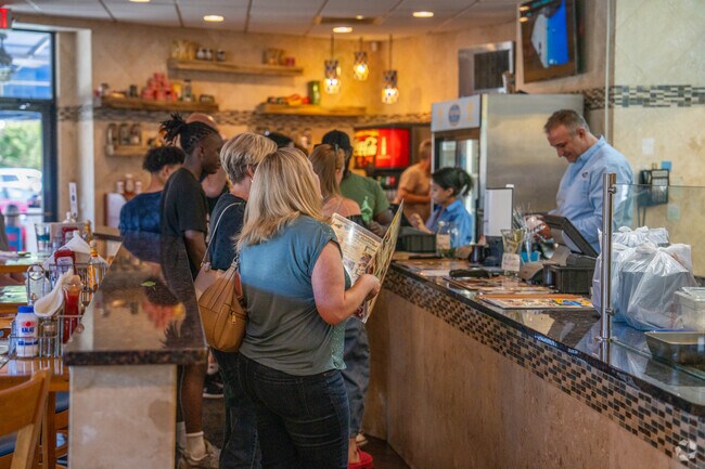 Savor authentic Greek flavors at Yeero Village, a local favorite in Sandy Plains.