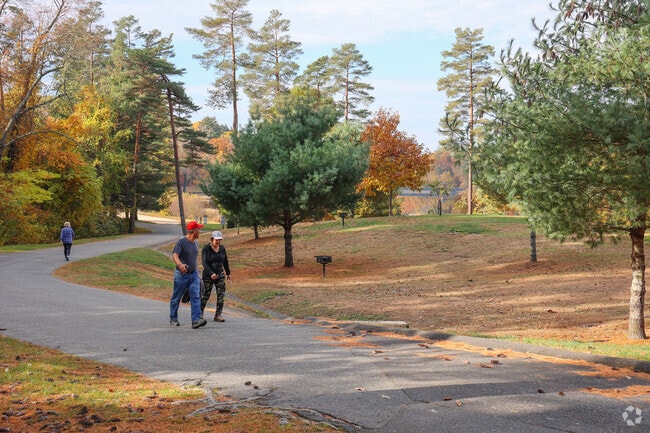Westover residence enjoy an early morning walk around Chicopee State Park.