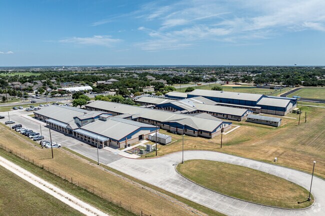 The Mighty Bobcat mascot represents Barton Middle School.