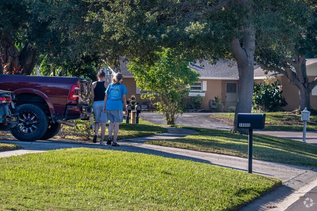 A mother and daughter go for a walk down the block in South Highpoint