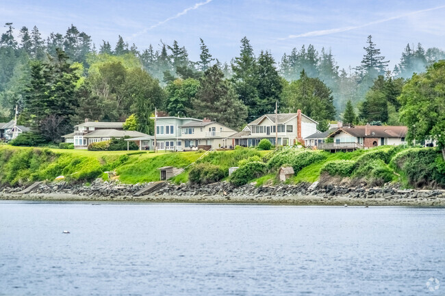 A row of beachside homes in the heart of Samish Island, overlooking Samish Bay.