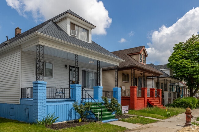 Colorful bungalows in Campau-Banglatown sit proudly on the street and offer large front porches.