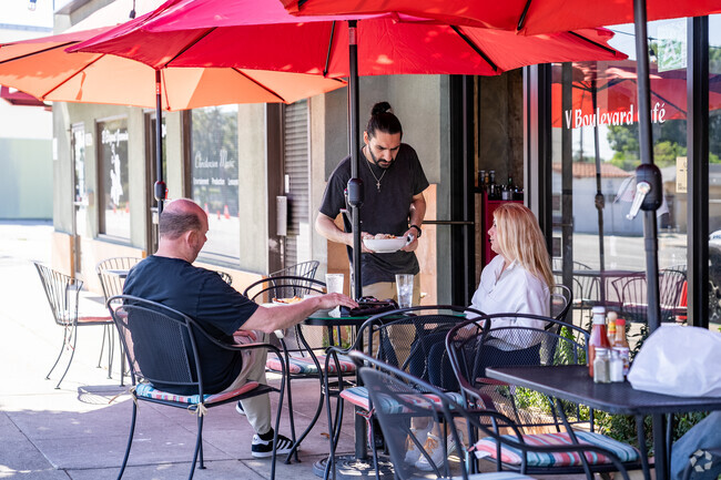 The cozy ambiance of V Boulevard Cafe in Rancho Riverside invites locals and visitors alike to relax and savor a cup of freshly brewed coffee.