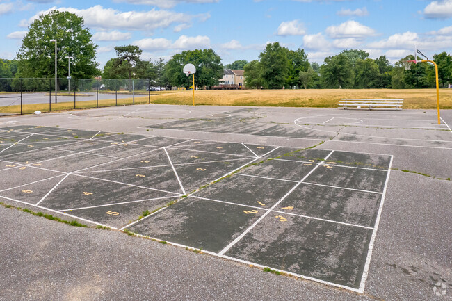 Sunset Elementary School offers outdoor basketball court for students to enjoy.