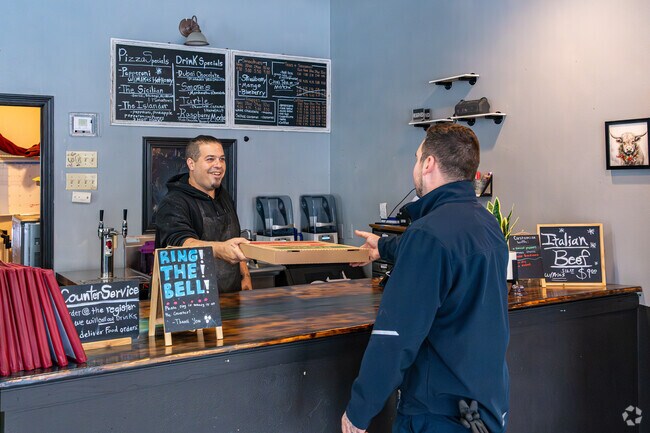 Fatboyz Pizza serves coffee and pastries by morning, and pizza and subs by night.