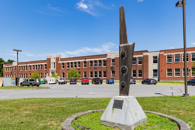 Highland Middle School has a Peace statue in the front.