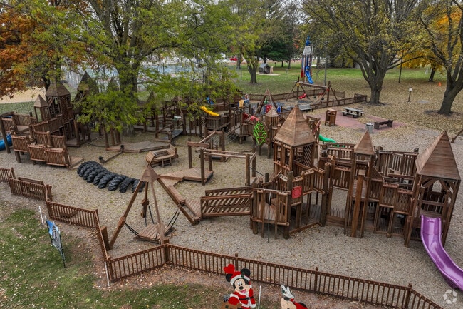 New Hampton’s Mikkelson Park features a large wooden playground great for families.