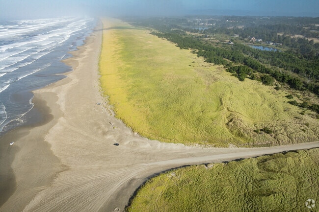 If your tired of walking the beach, why not drive the beach Sunset Beach State Recreation Site.
