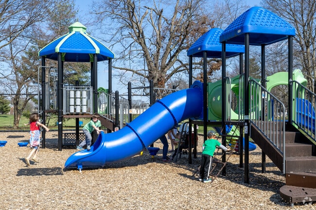 Children come from surrounding neighborhoods to the playground in Hurstbourne Acres.