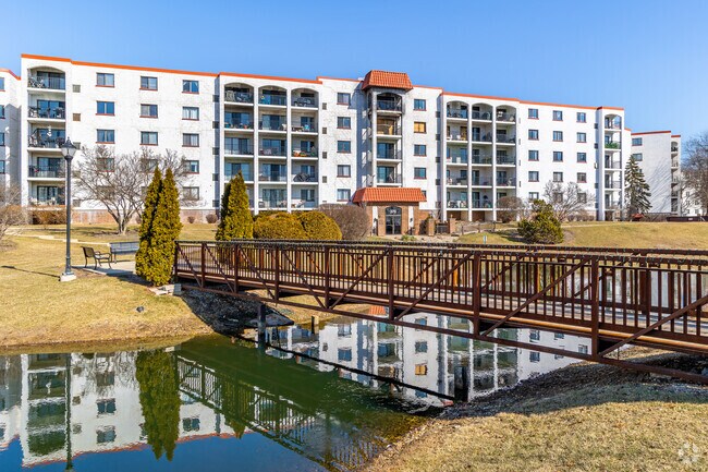 Among the housing options in Wheeling are condos with picturesque landscaping.