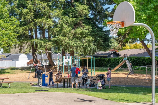 Families enjoy the playground at Vose Elementary School.