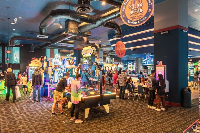 Kids and adults alike enjoy the arcade in Ward Village.