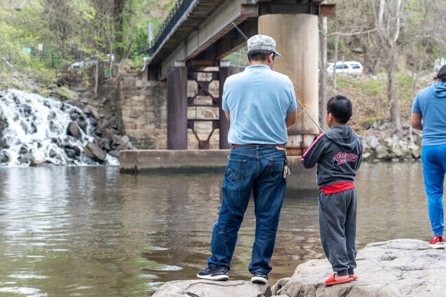 An Occoquan Dad teaches his son how to fish.