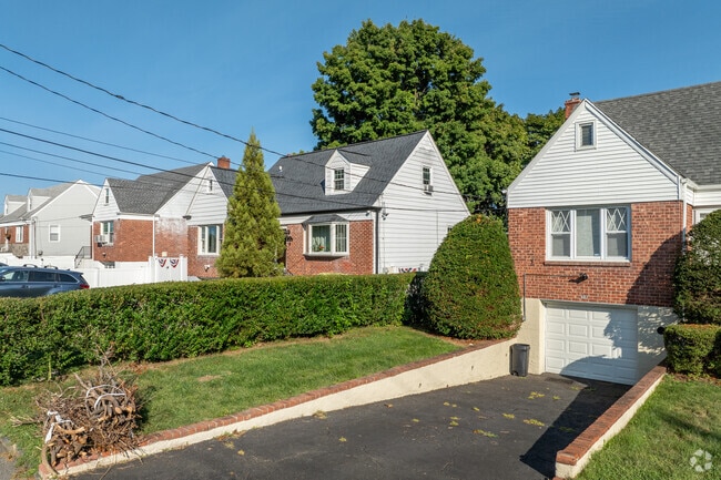 Northeast Yonkers has many charming homes with garages and driveways.