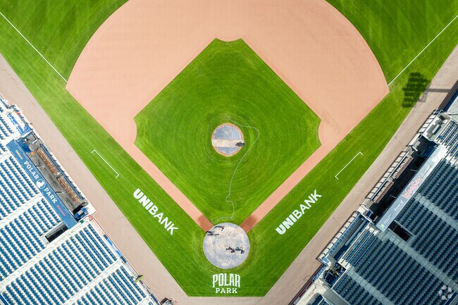 Baseball groundskeepers take great care of Polar Park's baseball diamond in Green Island.