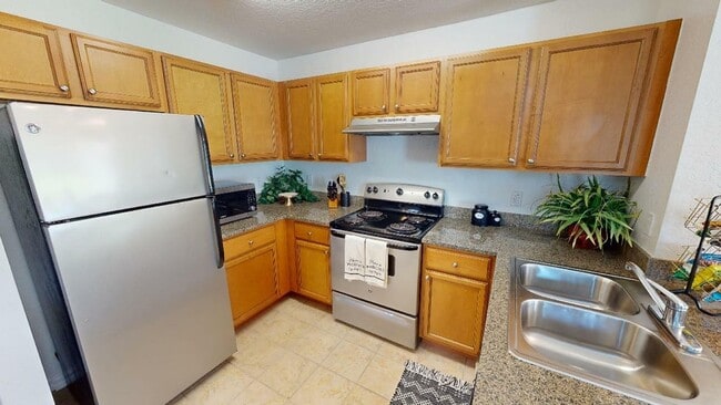 Kitchen with stainless steel appliances at Reserve at Brookhaven