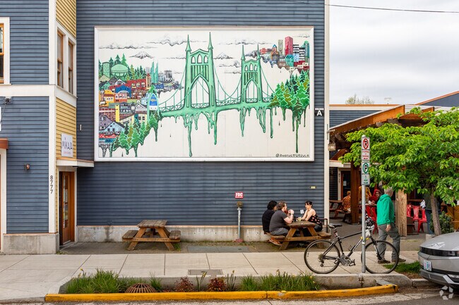 St John's Bridge Mural above diners in  the Cathedral Park Neighborhood.