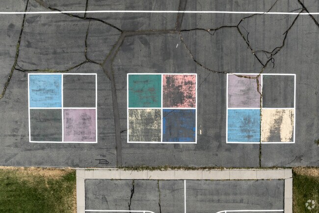 Douglas T. Orchard Elementary students can play on colorful four square courts at recess.