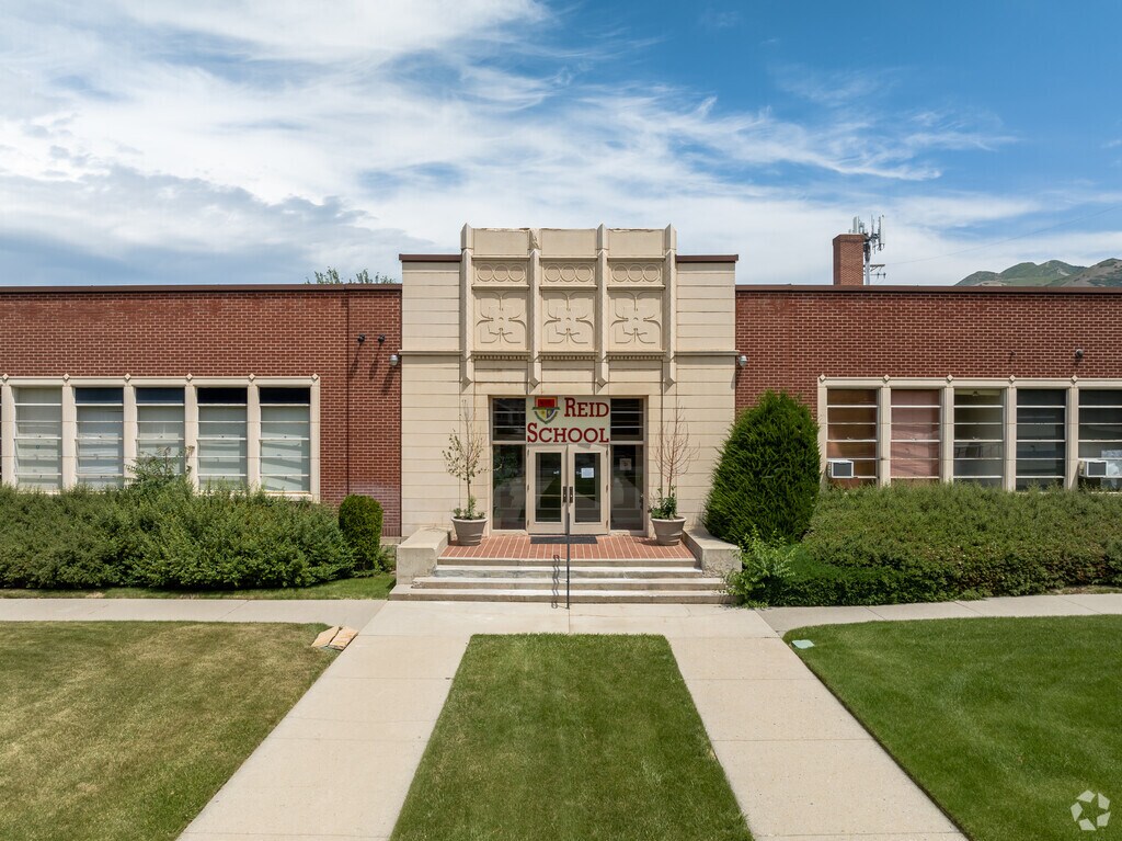 Beautiful red brick and light stone details at the entrance of Reid School in East Millcreek.