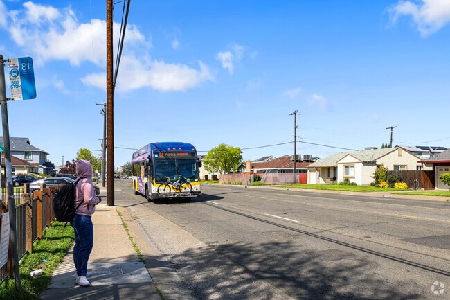 Waiting at the bus stop in Sacramento’s Tahoe Park South.