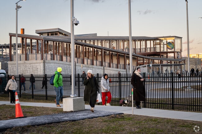 Local commuters returning home from the rail train in Pawtucket Station near Darlington, RI.