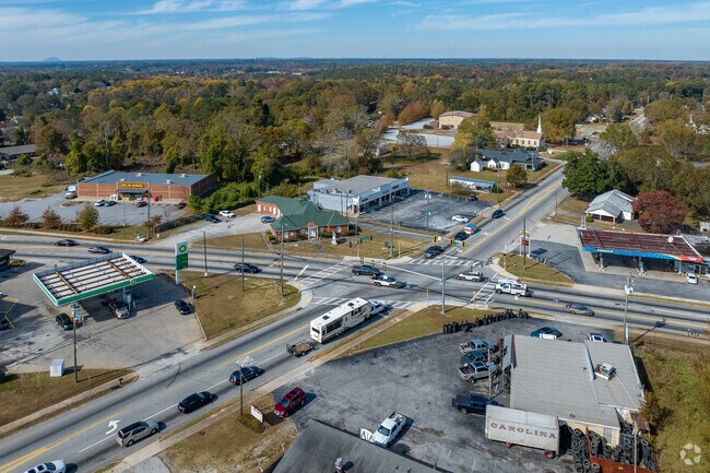 Walnut Grove extends out from the intersection of US Highways 81 and 138.
