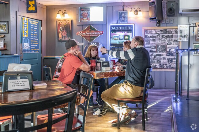 Neighbors gather for lunch at the corner bar called Mundy's Place in First Ward.