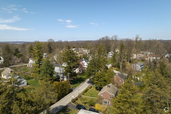 Aerial view showing homes nestled in nature, in Paoli.
