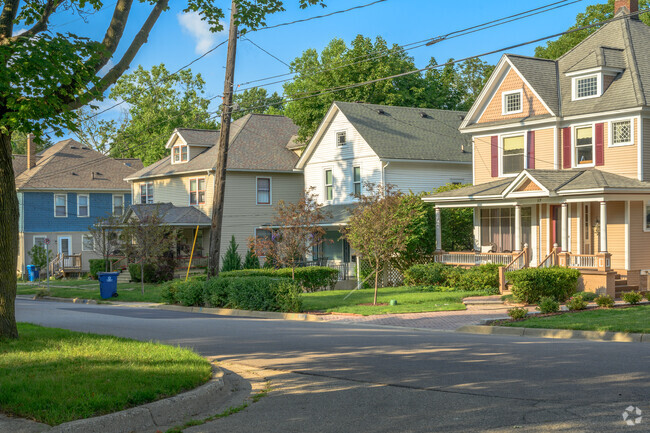 A row of early 20th-century homes  line a street in the West Main Hill neighborhood.