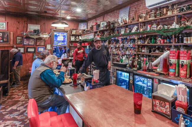 Take a seat at Herby K's in Queensborough for the best seafood & bread pudding to be found.