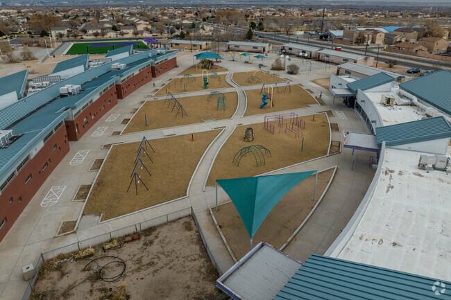 Swing sets and play equipment at Edward Gonzales Elementary School.