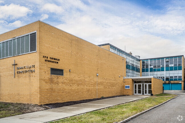 John F Kennedy Catholic School offers students many activities including musicals and art.
