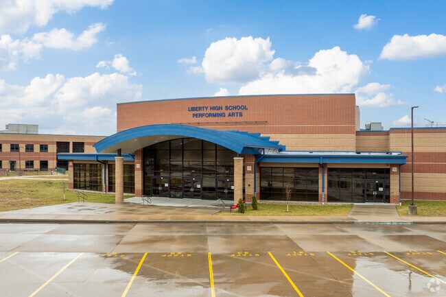 The west entrance to Liberty High School leads to the performing arts center.