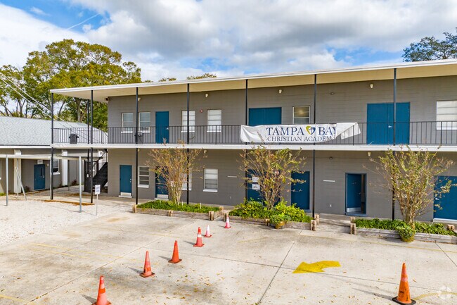 Tampa Bay Christian Academy's signage is displayed on their second floor railing.