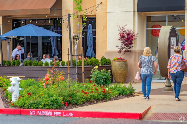 Enjoy the well-maintained foliage and fountain sounds while shopping or dining in Harding.
