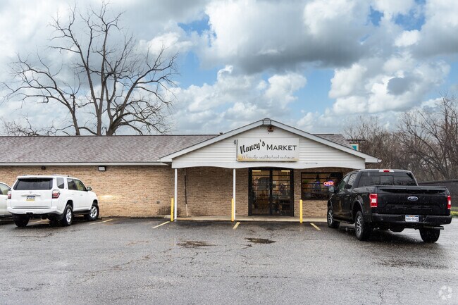 Pick up essentials at Nancy's Market in the Altizer neighborhood.