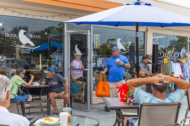 Live music and beautiful weather draw a crowd at Culture Coffee in East Englewood.