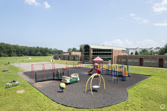 Kids love the playground at Shatecon Elementary School.